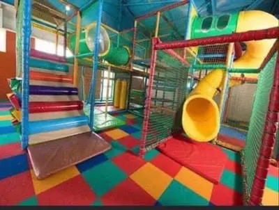 a colorful playground with a slide and a slideintend at LA07 Oceanview in Morecambe
