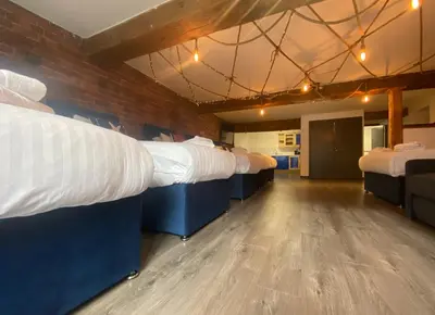 a room with two bunk beds in it at Rainford Gardens by UStay Aparthotels in Liverpool