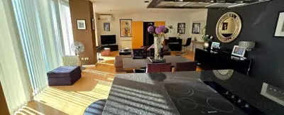 a living room with a couch and a table at Luxury Apartment Best location in Liverpool city center in Liverpool
