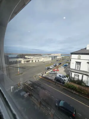 a view from a window of a street with cars at Lakeview Apartment, central location, Sea and Lake view, free parking & WiFi in Southport