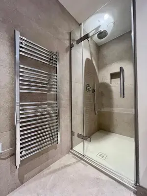 a shower with a glass door in a bathroom at The Apartments Lytham Square in Lytham St Annes