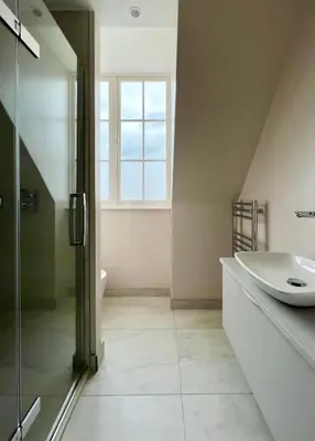 a bathroom with a sink and a window at The Apartments Lytham Square in Lytham St Annes