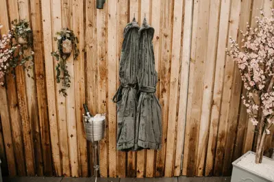 a towel hanging on a wooden fence at The Old Brewery in Ulverston