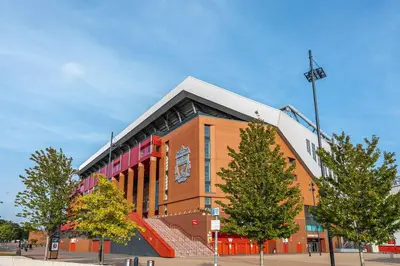 a large building with trees in front of it at Stunning house close to the stadium + Hot tub! in Liverpool