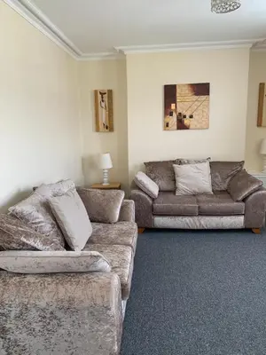 a living room with two couches and a couch at RUDGRAVE SQUARE WALLASEY in Wallasey