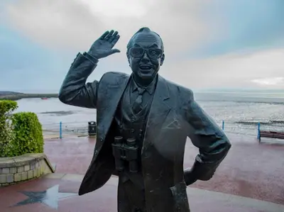 a statue of a man in a suit at The Artist Studio in Hest Bank