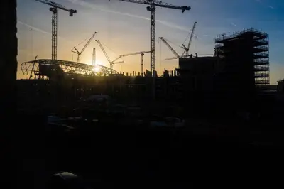 a silhouette of a construction site with cranes at RST Bramley Moore in Liverpool