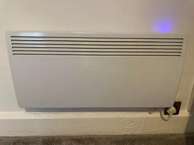 a white radiator is sitting on a wall at The New Apollo Hotel in Blackpool