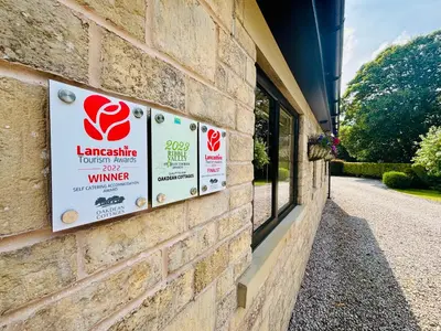 a sign on the side of a building at Oakdean Lodge in The Ribble Valley in Whalley