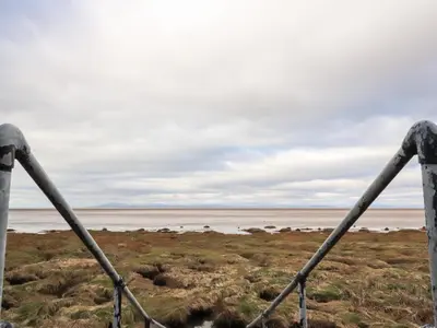 a view of the ocean from a fence at Ferry View in Fleetwood