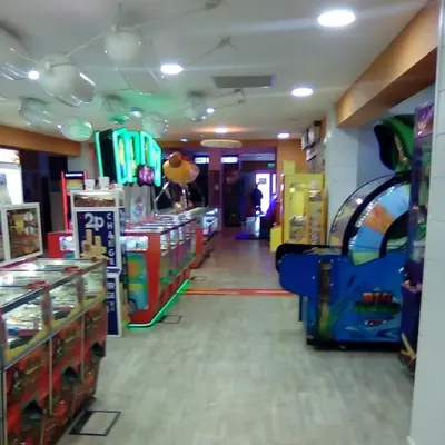 a room with a arcade with a video game at Roadnights Retreat in Heysham