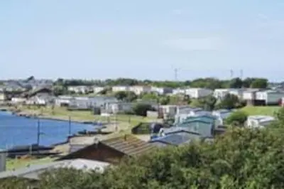 a view of a harbor with a body of water at Beauview Brand New For 2023 Wi-Fi and Smart TV in Millom