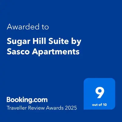 a blue screen with the text awarded to sugar hill suite by sasco apartments at Sugar Hill Suite by Sasco Apartments in Blackpool