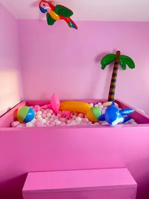 a toy room with a pink room with a toy tub at #1 Most Viral Pink House w Ball Pit in Liverpool