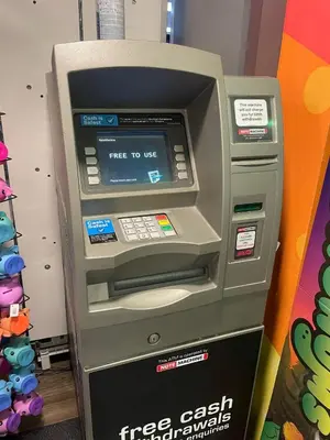 a free cash redemption machine in a store at Caravan - Sleeps up to 8 & Free parking in Grange Over Sands