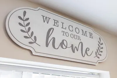 a sign that reads welcome to our home on a wall at Toft House - Air Host & Stay - Free Parking - Contractor Friendly in Liverpool