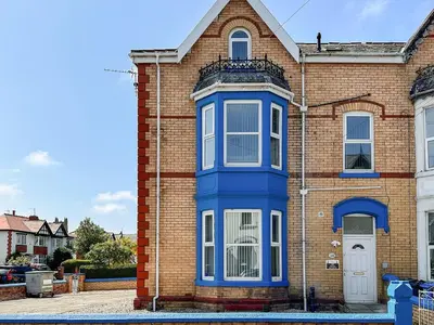 a blue front door of a brick house at One - Uk43696 in Saint Annes on the Sea