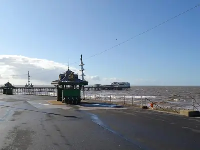 a small building on the side of a beach at Two - Uk43700 in Saint Annes on the Sea