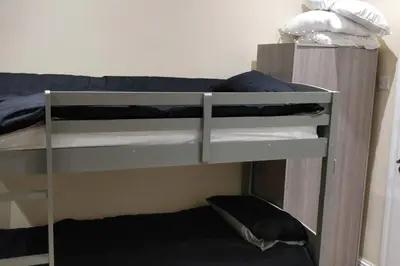a couple of bunk beds in a room at LFC Stadium Apartment 1 in Liverpool