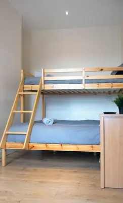 a couple of bunk beds in a room at LFC Stadium Apartment 4 in Liverpool