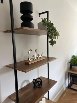 a wooden shelf with a pair of scissors on it at The 9th Hole - Two-Bedroom Apartment in Birkdale, 1 mile from Royal Birkdale Golf Club in Southport