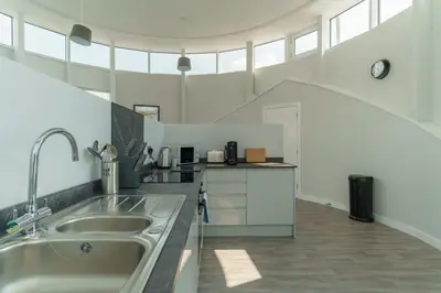 a kitchen with a sink and a counter top at Stunning 2 Bedroom Apartment in Liverpool in Liverpool